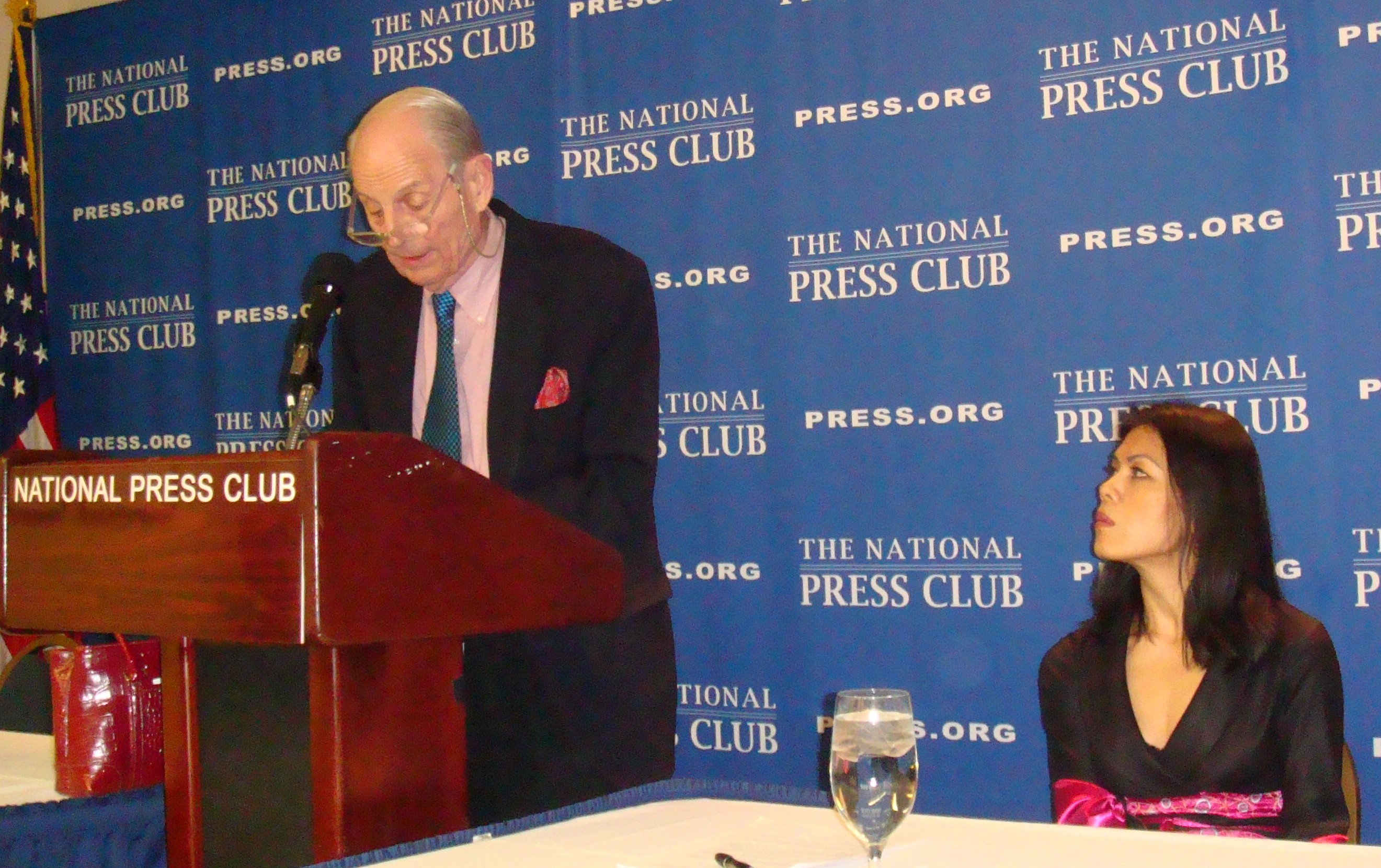 Peter Hickman introducing Theary Seng at the Newsmaker program of the National Press Club, March 2010