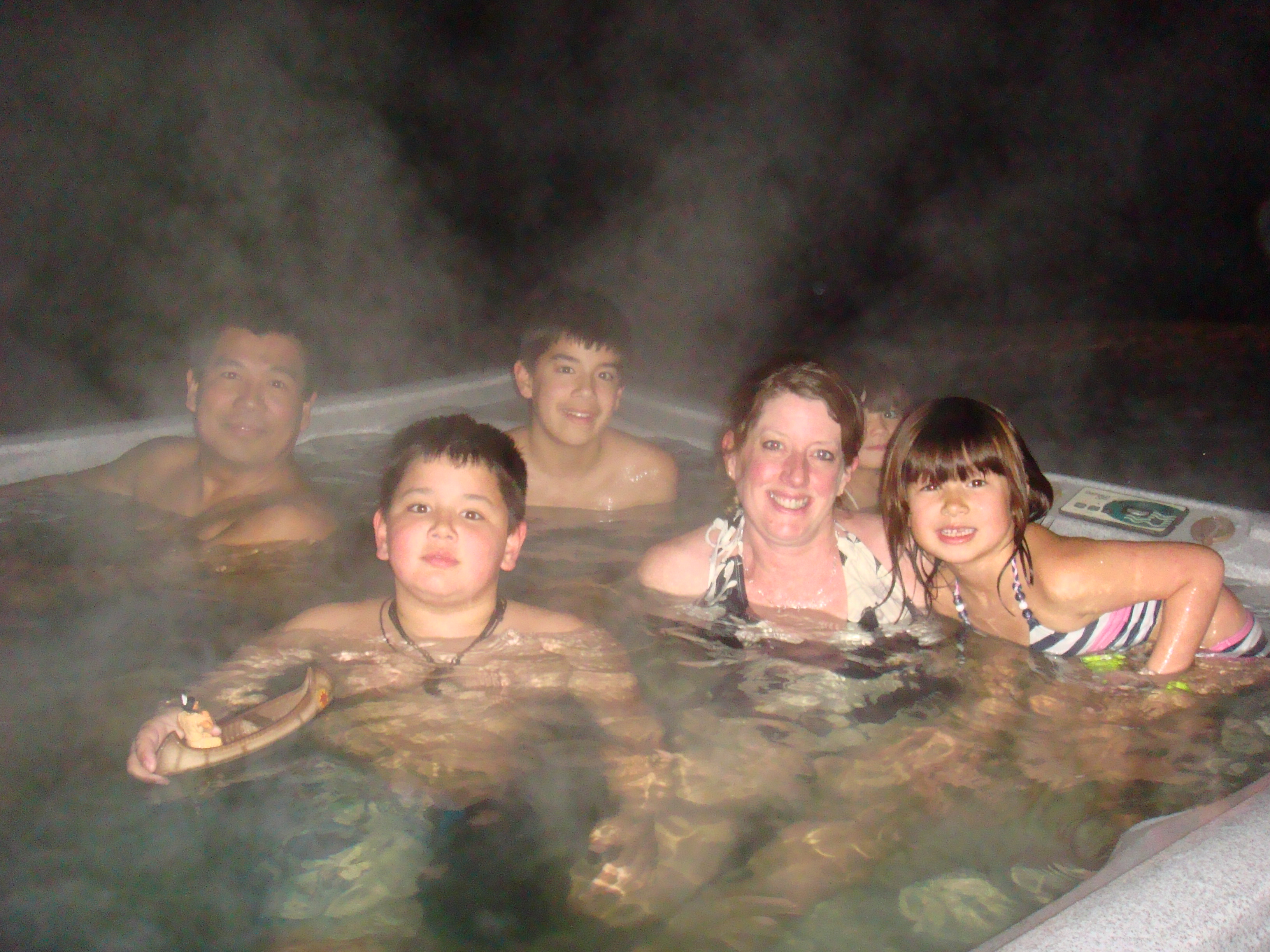 Sina, Nancy, Gabriel, Jared, Isabel Grace, Lily Seng in the hot tub (9 Jan. 2011)