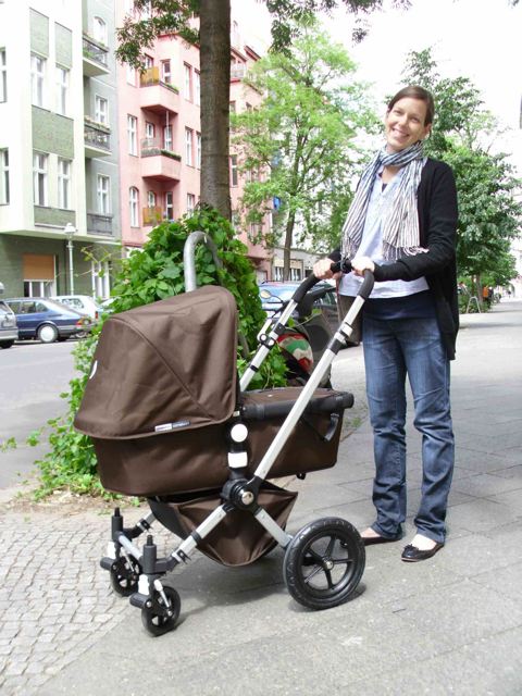 Judith Haugwitz in her krama and with baby Karl, Berlin 2010