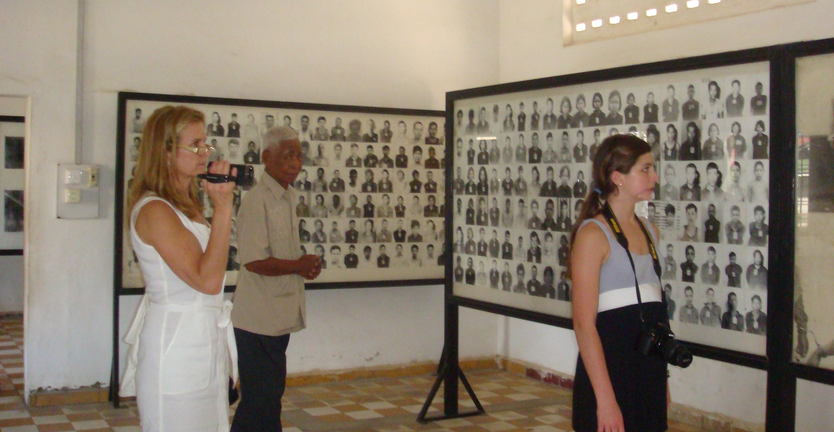 Kerry and Michaela Kennedy with Vann Nath, Tuol Sleng, 22 Feb. 2011